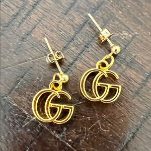 Gold GG stamped Gucci Dangle Earrings